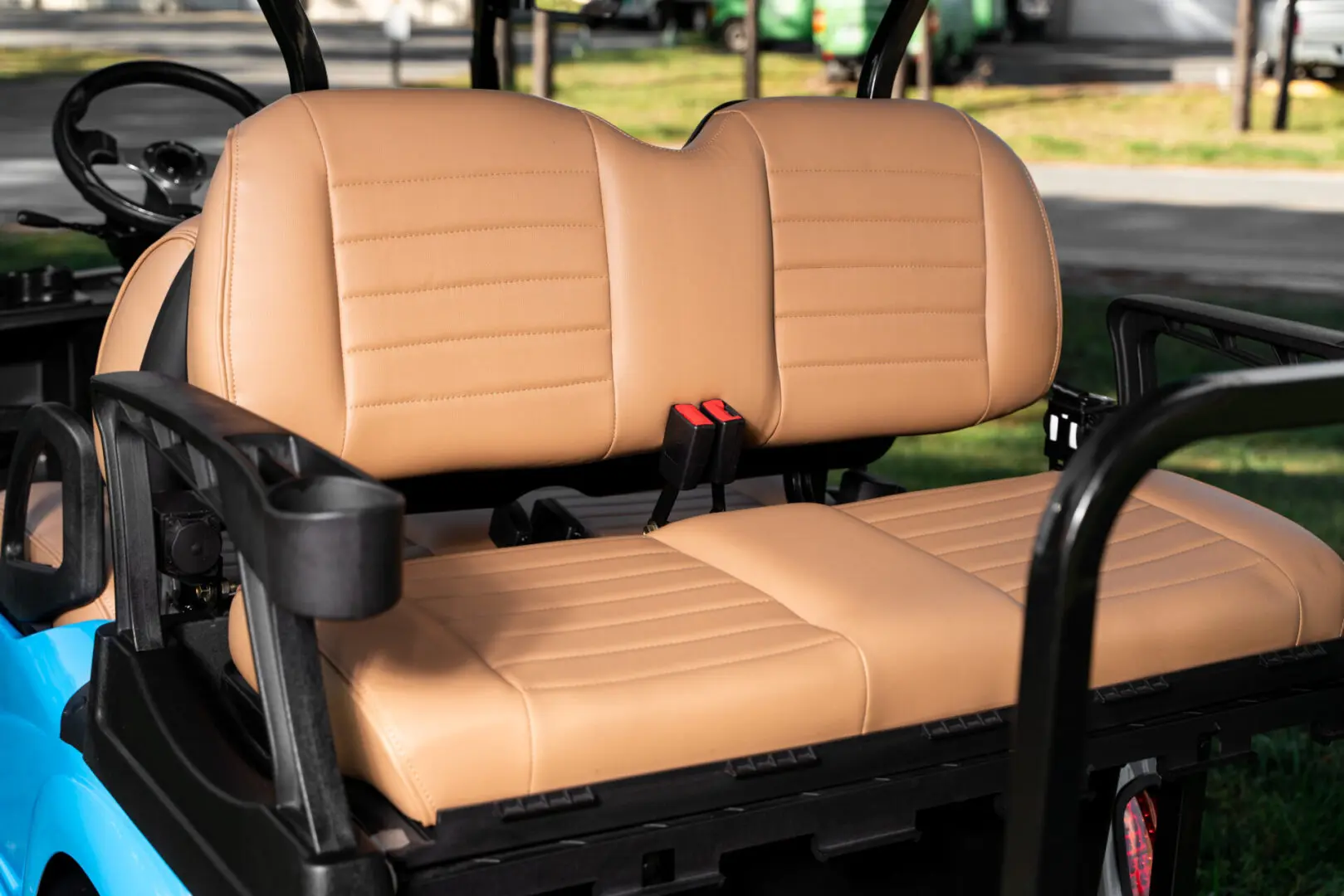 A close up of the back seats on a golf cart