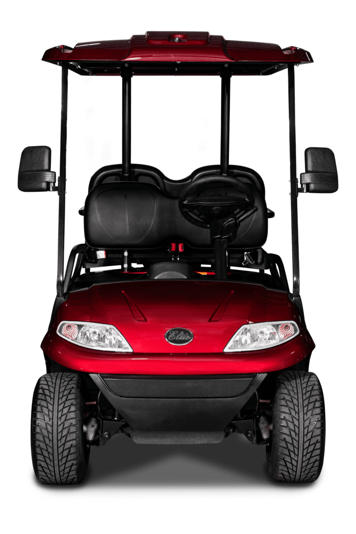 A red golf cart with two seats and four wheels.