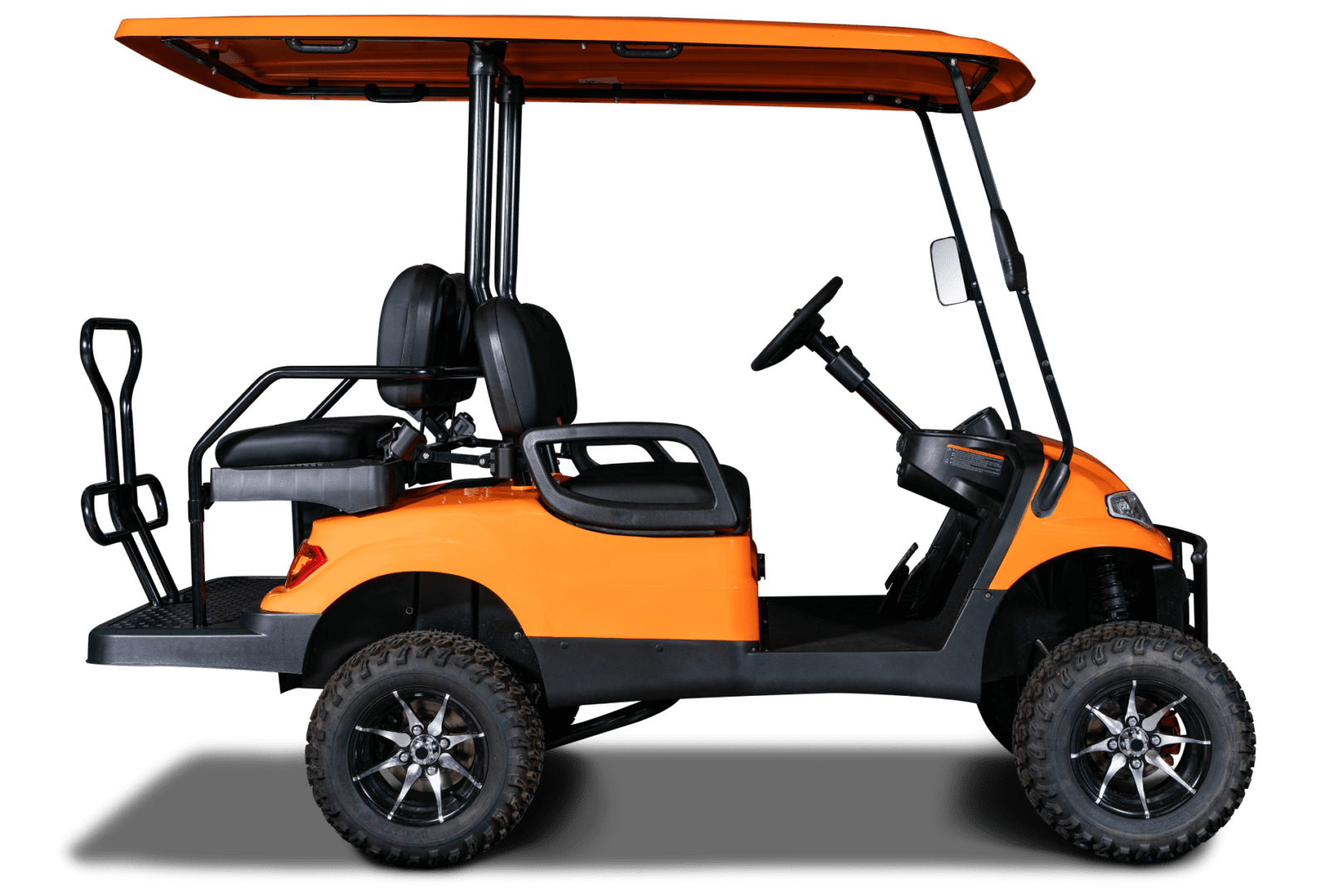 A golf cart with an orange top is parked.