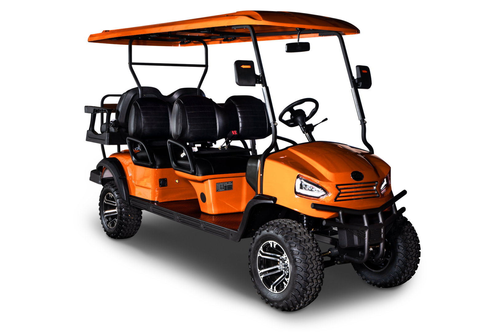 A golf cart with an orange top is shown.