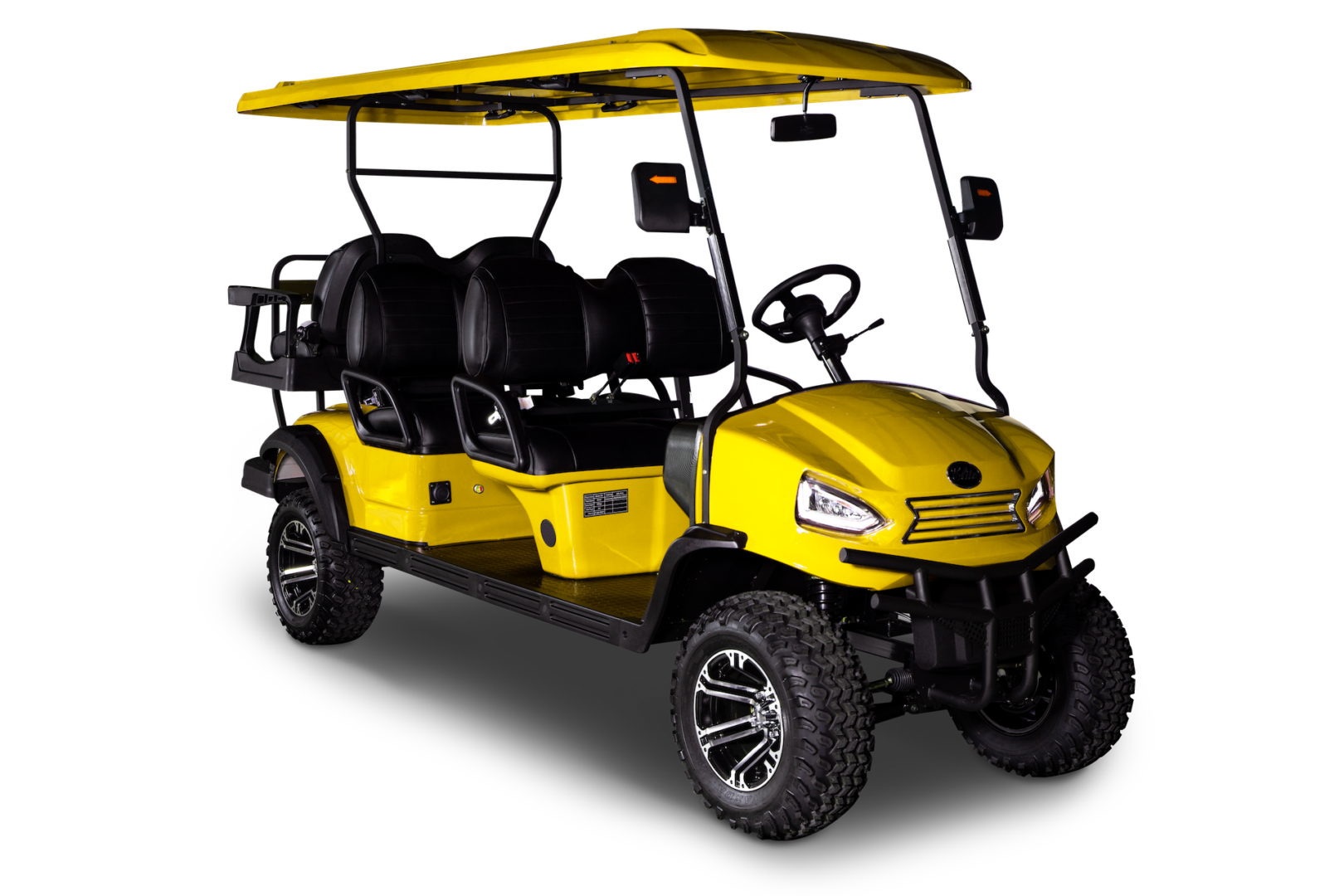A yellow golf cart with a black top.