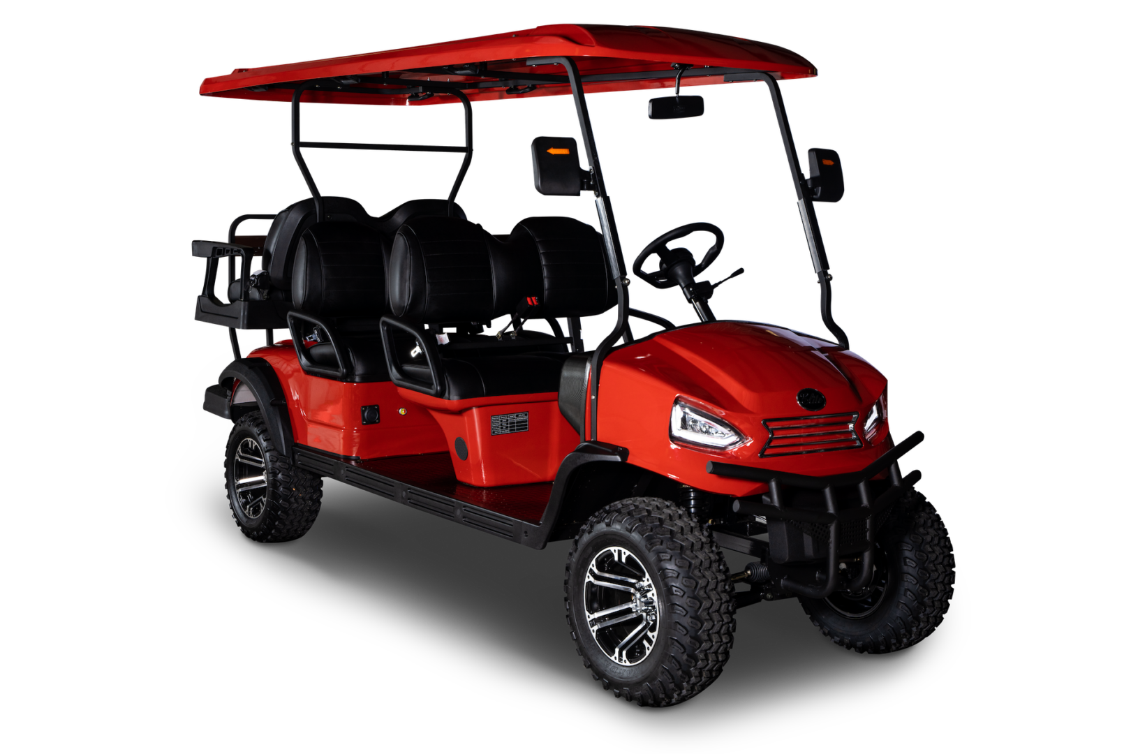 A red golf cart is shown on the ground.