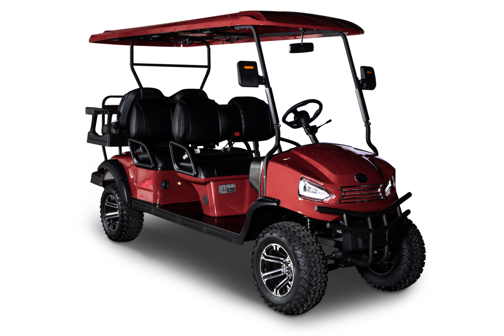A red golf cart is shown on the ground.